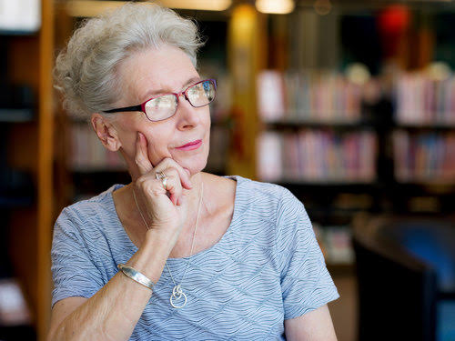 Portrait of elderly lady thinking something